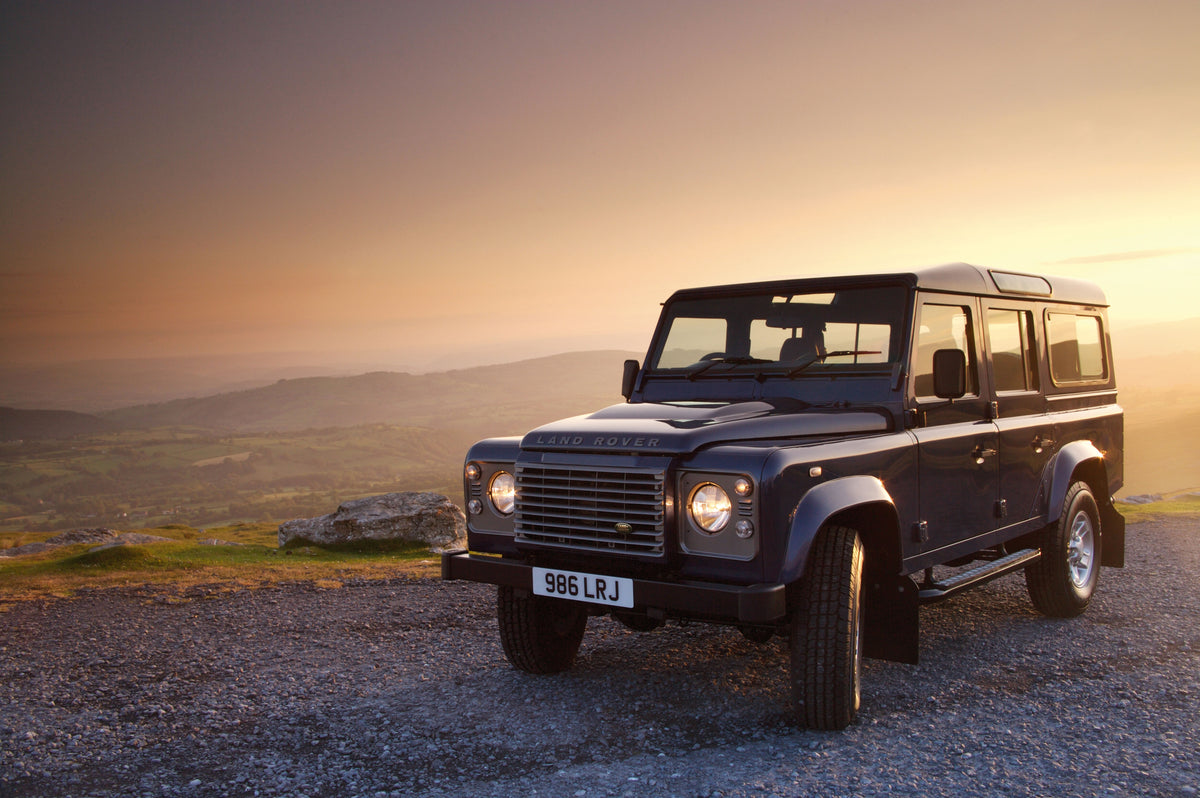 Land Rover Defender 110 at sunset