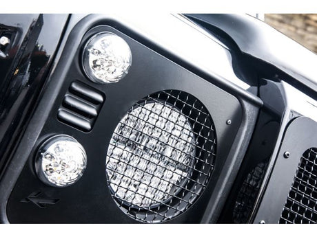 Defender military headlight covers with mesh - stainless steel - by chelsea truck company