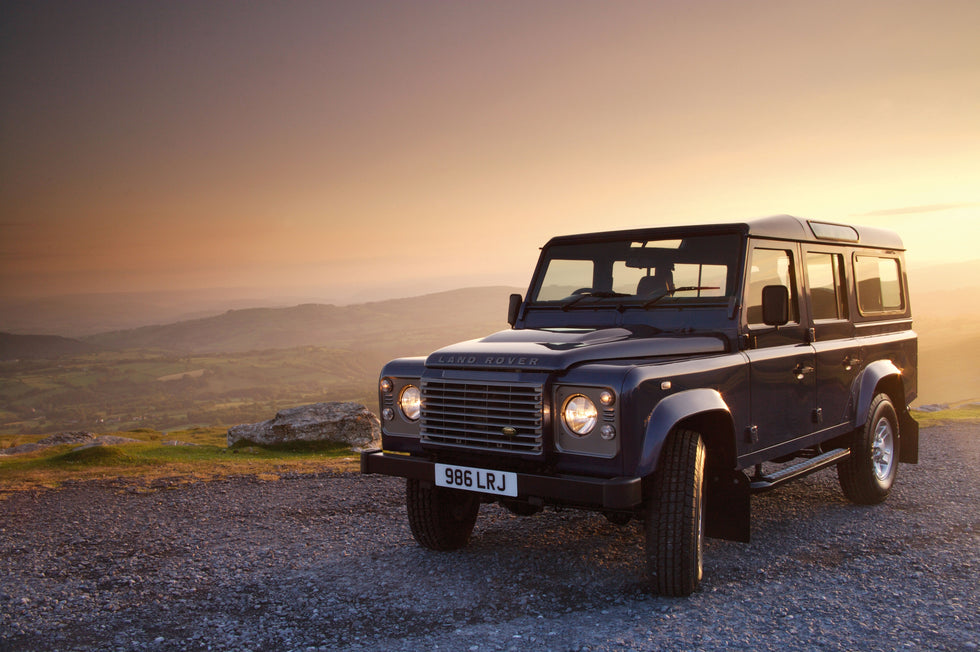 Land Rover Defender 110 at sunset