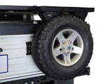 Spare wheel mounted shelf
