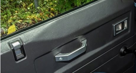 Defender door lever surround pair silver